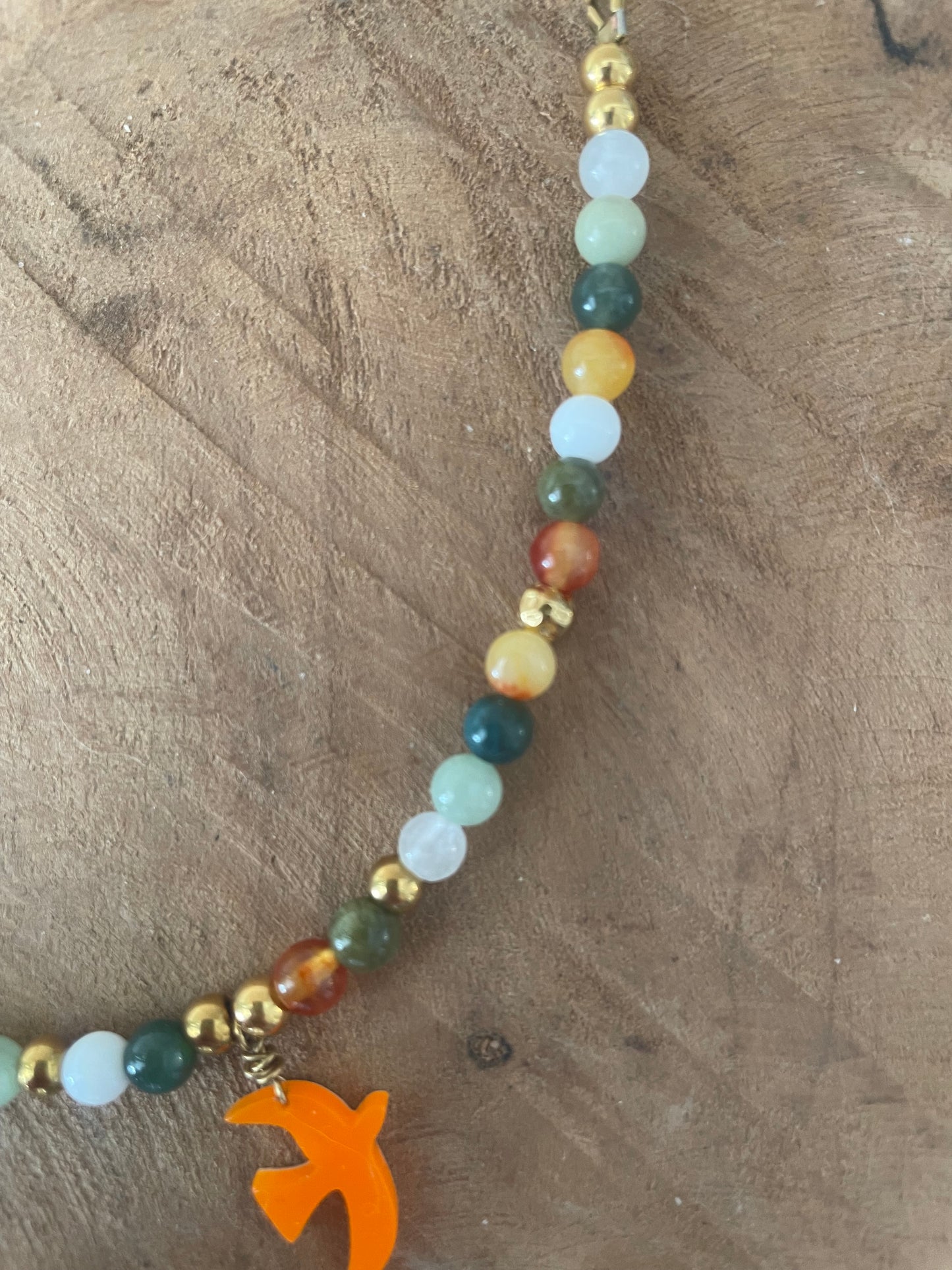 Autre angle bracelet liberté orange et vert acier inox doré breloque orange