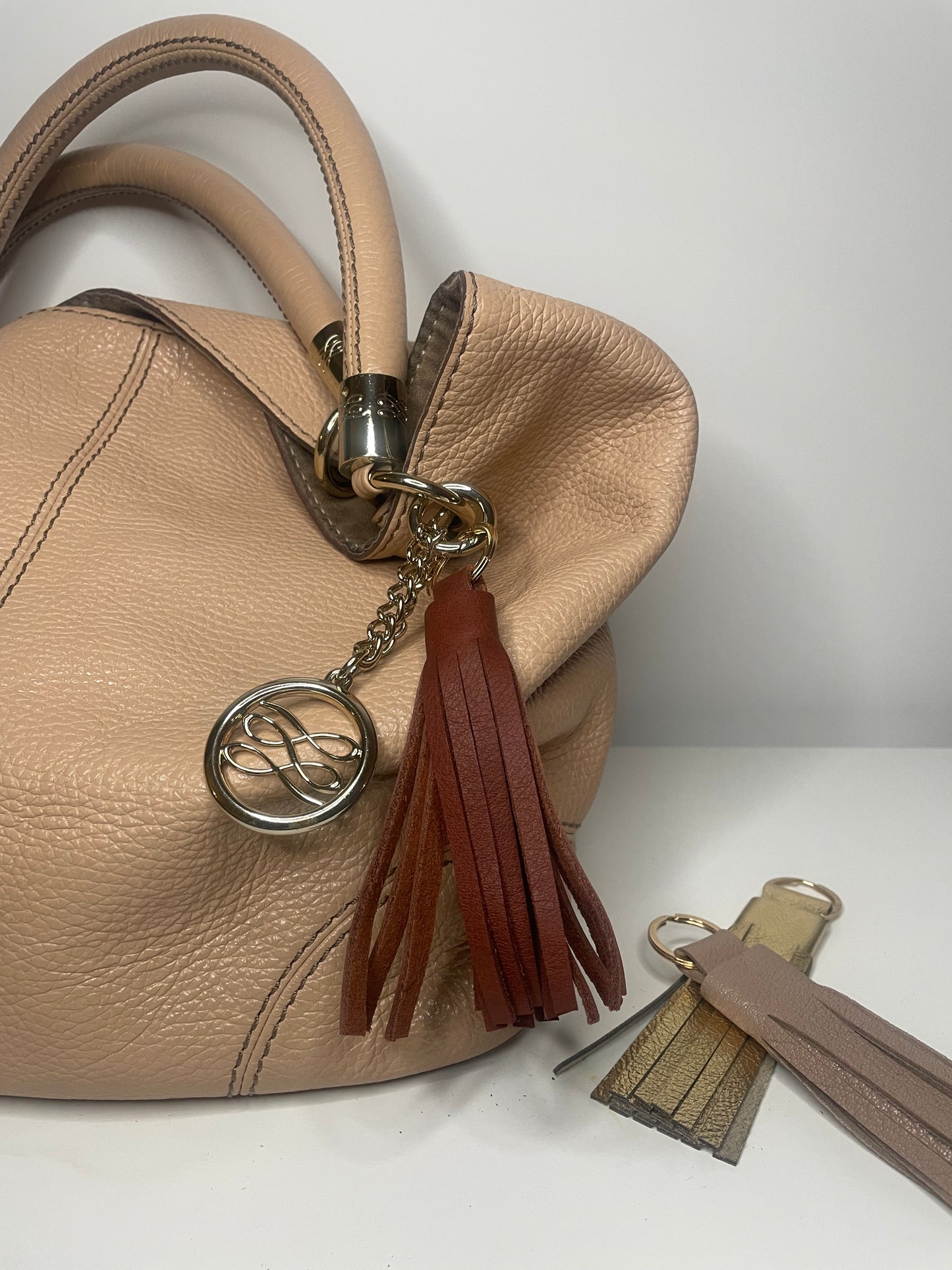 Porté bijou de sac pompon cuir fait main france