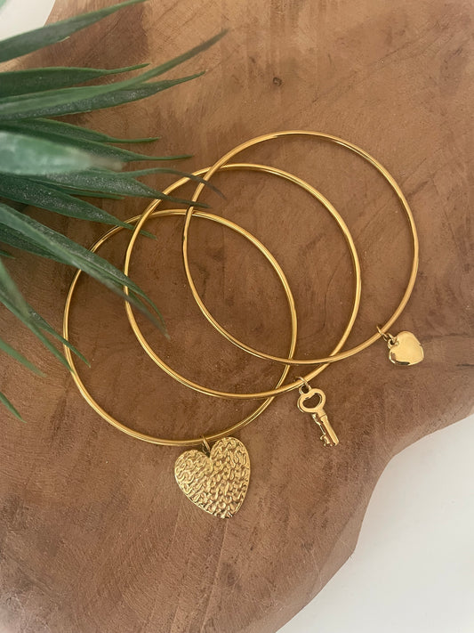 Lot de 3 bracelets joncs acier inox doré la clef de ton coeur breloque