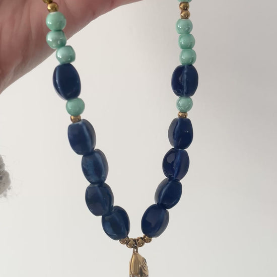 Vidéo collier poisson perles céramiques bleu turquoise doré poisson